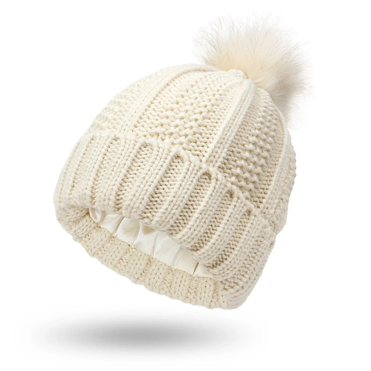 Cozy satin-lined knit beanies with pom poms in various colors for women's winter fashion