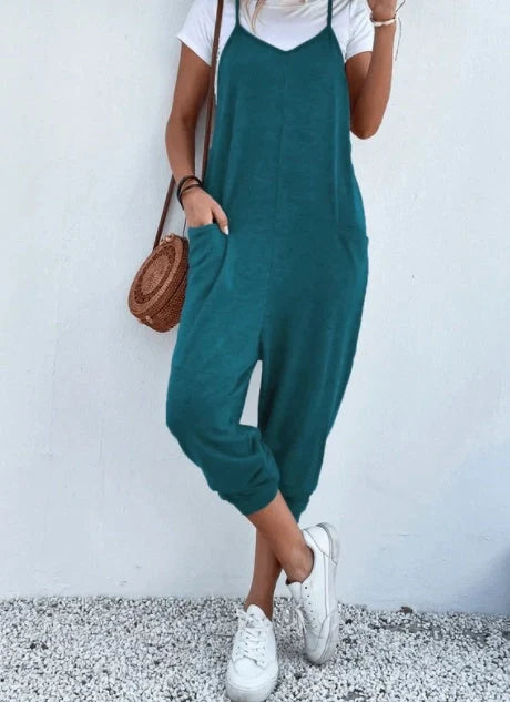 Women's sleeveless polyester jumpsuit with zipper and patch pockets in various colours