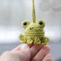 Handmade woven frog car pendant in plush material with cartoon styling