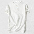 Men's loose cotton t-shirt in apricot colour showing pullover style with short sleeves