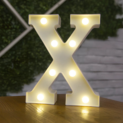 White plastic LED alphabet marquee sign with warm white illumination, 22cm height with battery operation