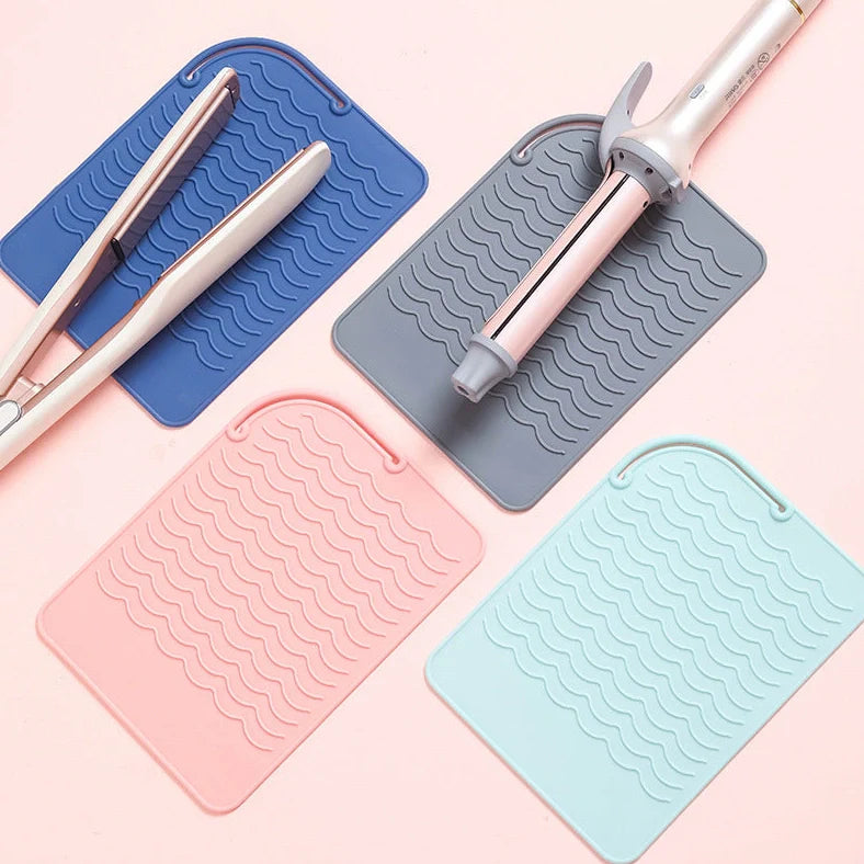Silicone heat-proof mat for hair styling tools in pink, green, dark blue, or grey