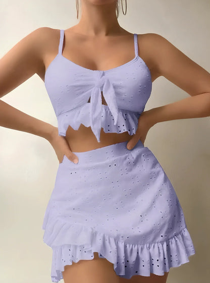 Women's 3-piece bikini set with hip-hugging skirt and ruffle detailing in polyester swimwear
