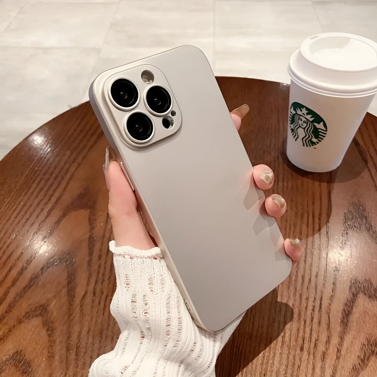 Ultra-thin frosted PC phone case with all-inclusive lens protection for iPhone, shown in Chinese Red