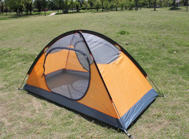 Double layer rainproof camping tent in green, orange, and blue for outdoor adventures