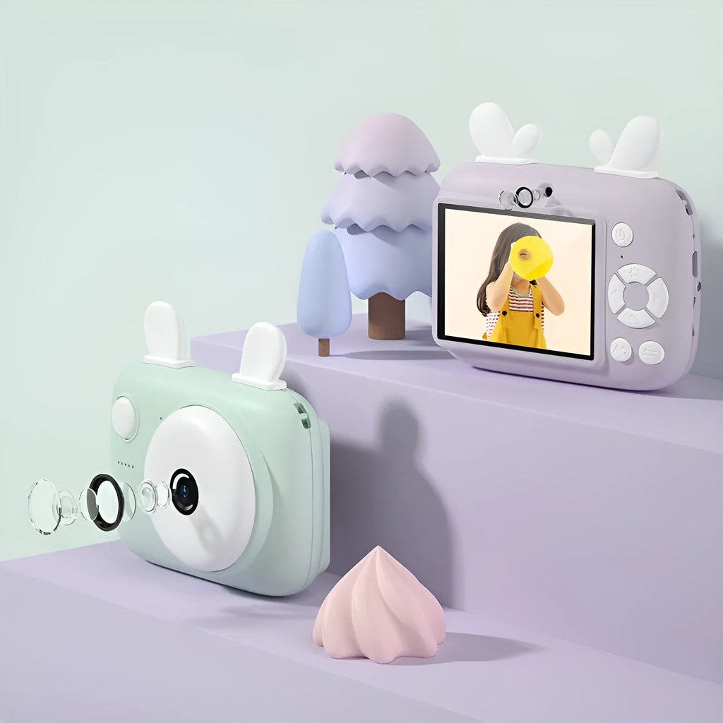 A2 kids digital camera in macaron design with colour screen, shown in green, pink, purple, and red.