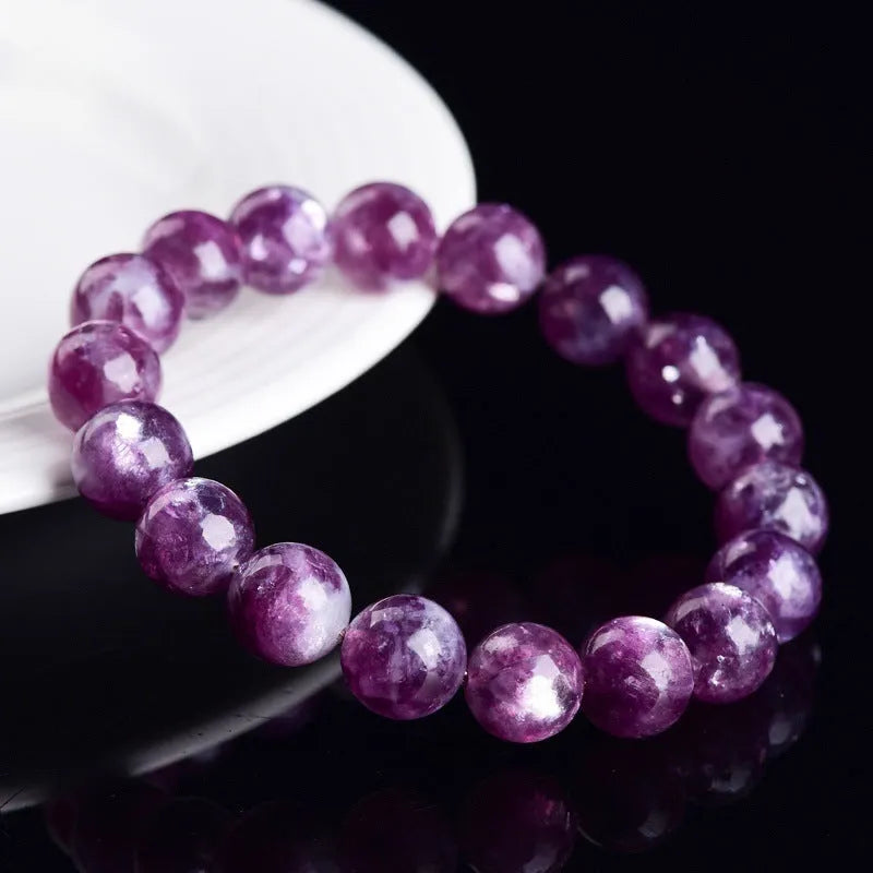 Geometric Korean-style polished crystal bracelet showing pink, pink purple, and purple colour options.