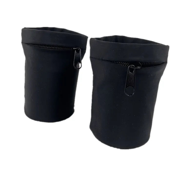 Compact 10 by 10.5 cm black armband sleeve for mobile phone, shown with packaging.
