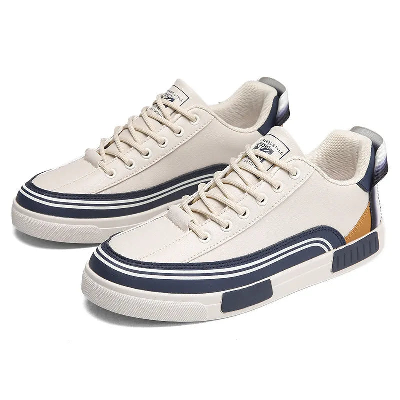 Men's beige and white with green casual canvas shoes showing mesh panel sections on sides.