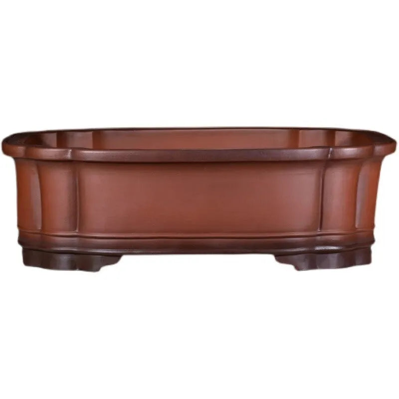Large antique finish purple clay flowerpot with carved tree stump design featuring pine, cypress, pomegranate, golden marble and crabapple motifs