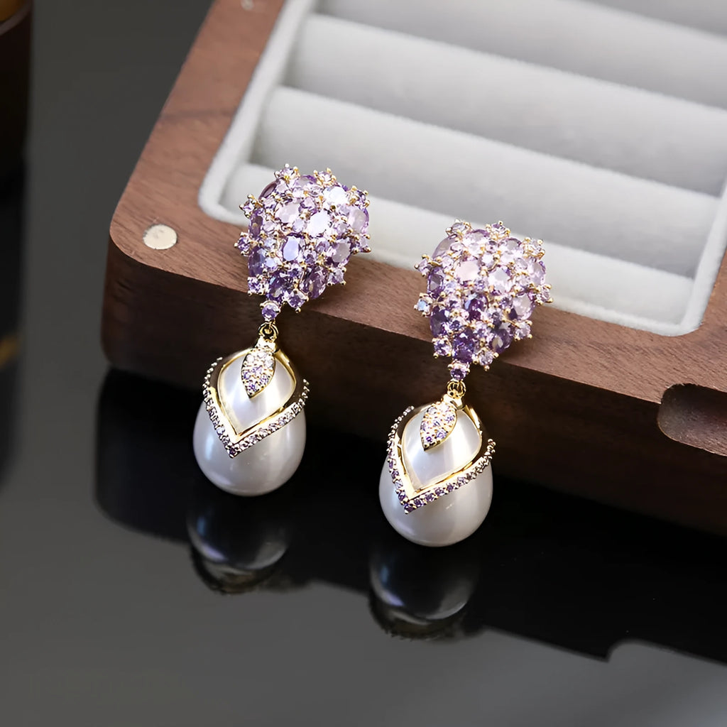 Women's drop-shaped pearl earrings with gemstone inlay in three colour variations
