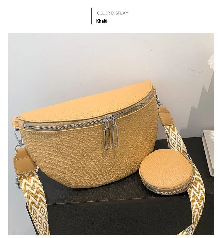Solid colour women's crossbody bag with saddle lock zipper and horizontal square shape