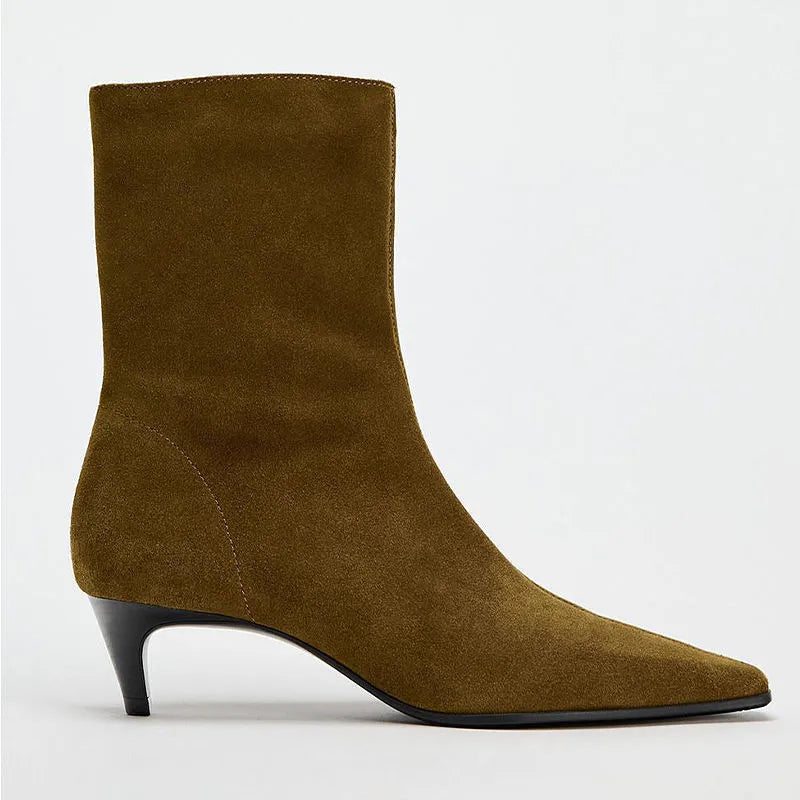 Brown women's square toe ankle boots with a side zipper and a mid-height stiletto heel on a waterproof platform sole.
