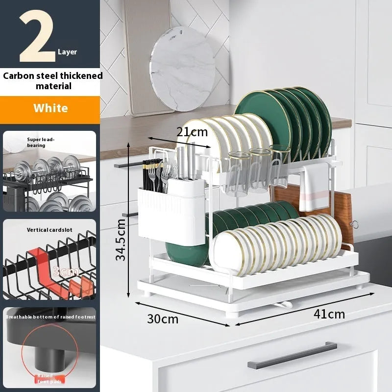 White double-layer metal kitchen draining rack with a removable top tray on a countertop.