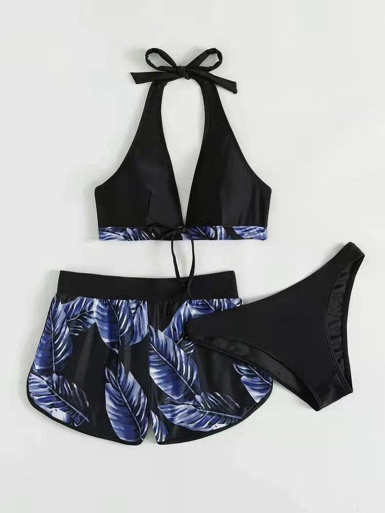Chic leaf-patterned women's swimsuit set with bikini top, bottoms, and matching shorts in various vibrant colors