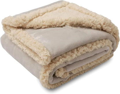 Cozy and comfortable pet blanket for dog kennels, made with flannel, wool, and sherpa for maximum warmth and style