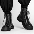 Men's black mid-top Martin boots with a flat rubber sole and leather-style upper