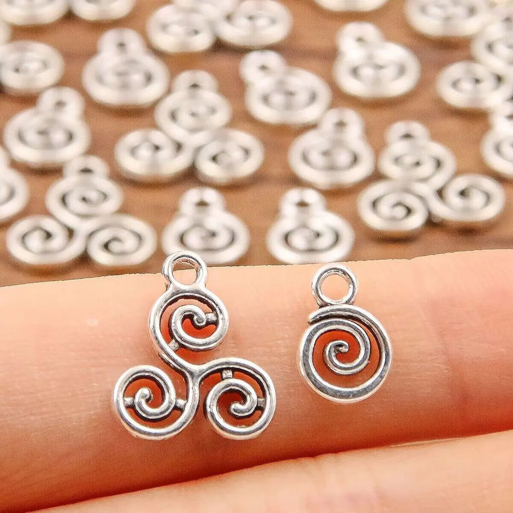 Double-sided hollow circle pendant in alloy with electroplated finish, simple round style, 7x11mm size on white background