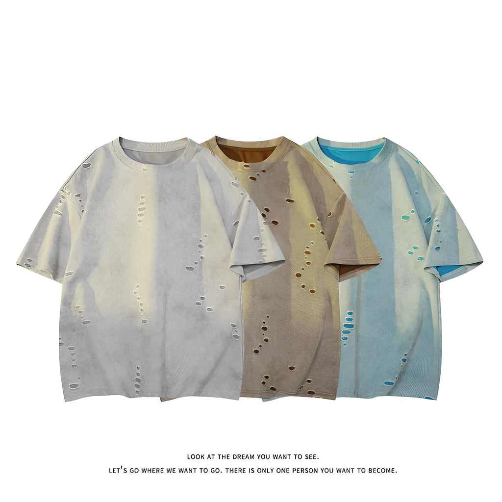 Men's grey loose-fit cotton blend short sleeve t-shirt with a distressed design on the front.