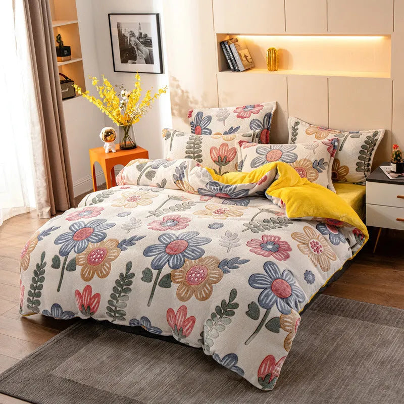 Four-piece milk velvet bedding set with quilt cover, bed sheet, and pillowcases in warm colour
