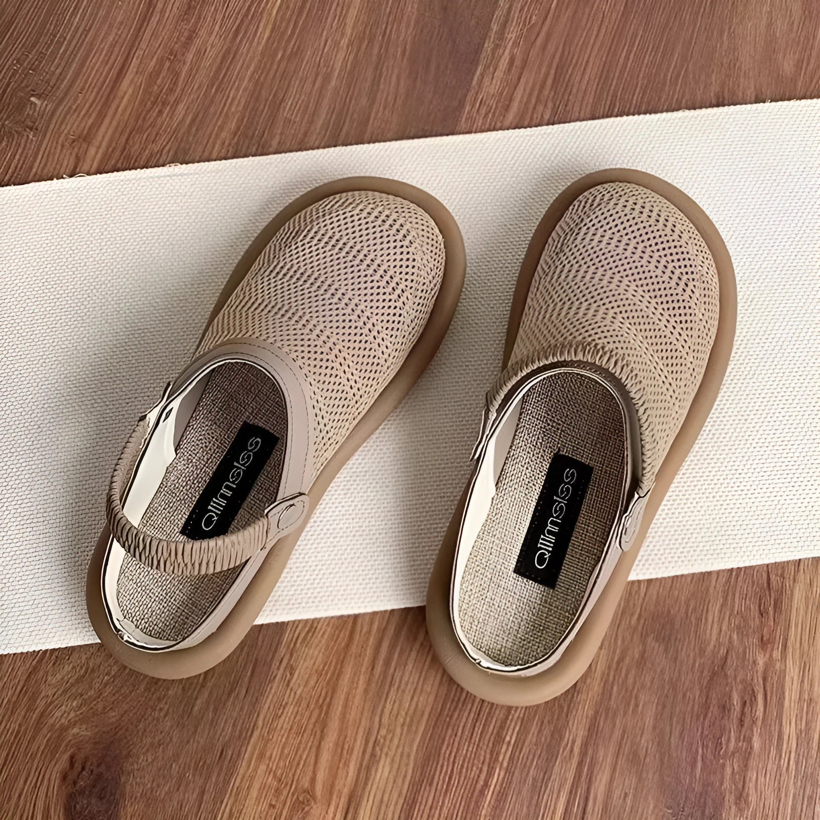 Breathable mesh slip-on shoes in beige with a round toe and low-top design on a rubber sole.