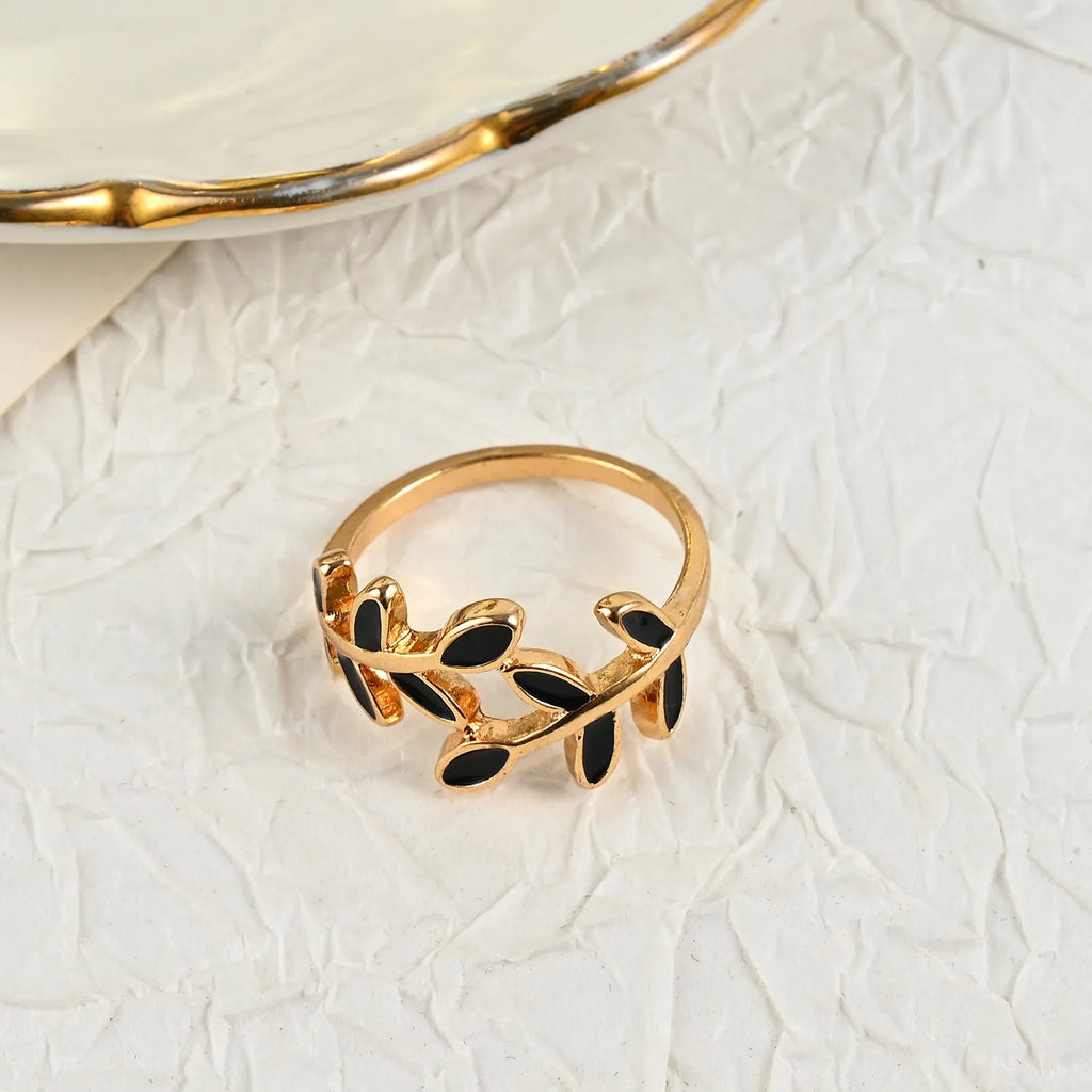 Gold electroplated acrylic ring with geometric leaf pattern for women's index finger