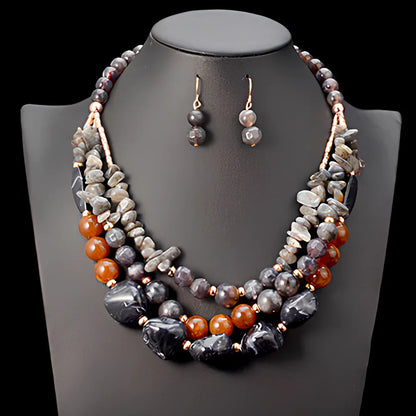 African beads jewellery set in black with 45cm plastic bead necklace and 5cm round earrings on zinc alloy