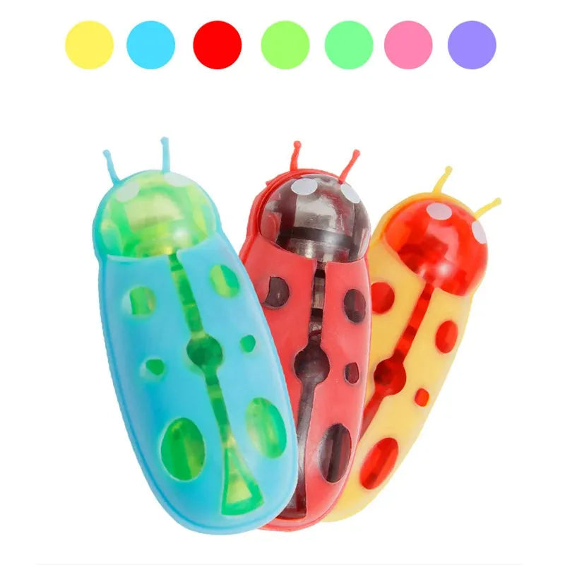 Mini electric ladybird bug cat toy crawling on floor with PVC construction and automatic movement