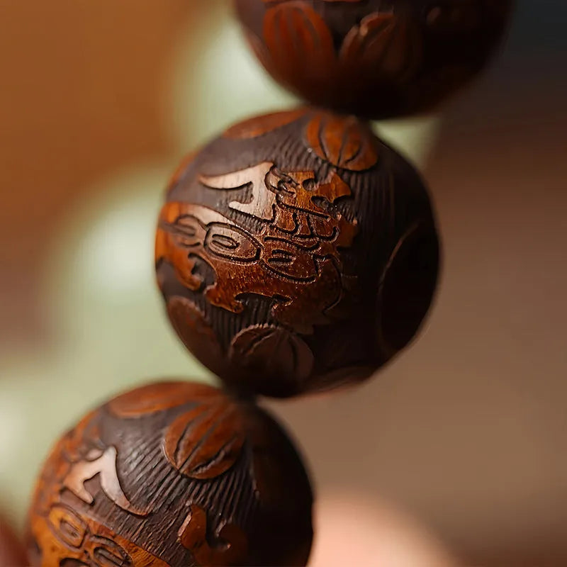 Rosewood bracelet with carved Fu character and amass fortunes motif on 20mm beads