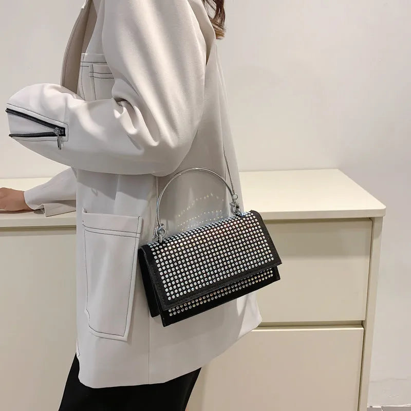 Small square chain crossbody bag for women with rhinestones in silver and black, PU construction with crossbody strap