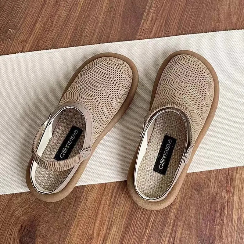 Breathable mesh slip-on shoes in beige with a round toe and low-top design on a rubber sole.