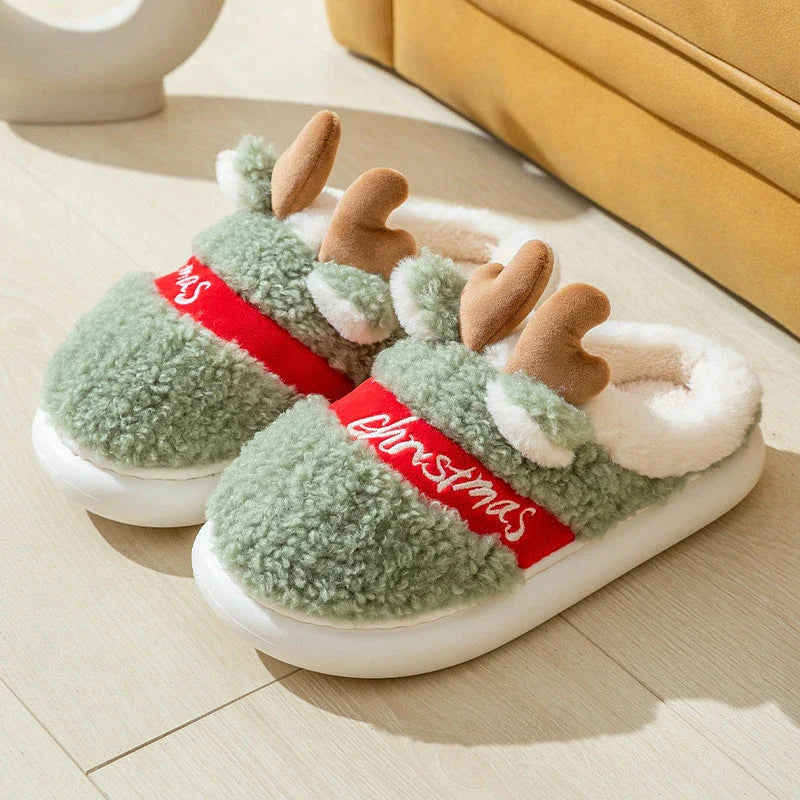 Cozy festive elk-themed slippers in red and green colors, featuring plush, soft materials for comfortable indoor wear