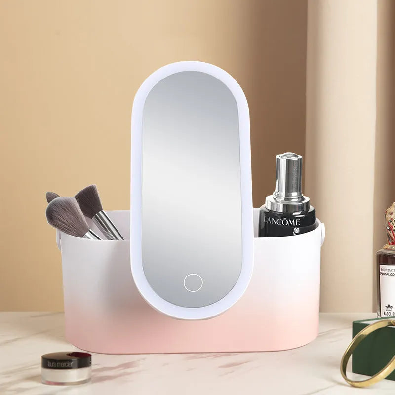 Pink gradient LED makeup mirror open showing storage compartment and USB charging port