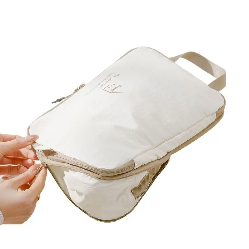 Taslon travel storage bag set with compression big bag, medium bag, shoe bag, and underwear bag for luggage organisation.