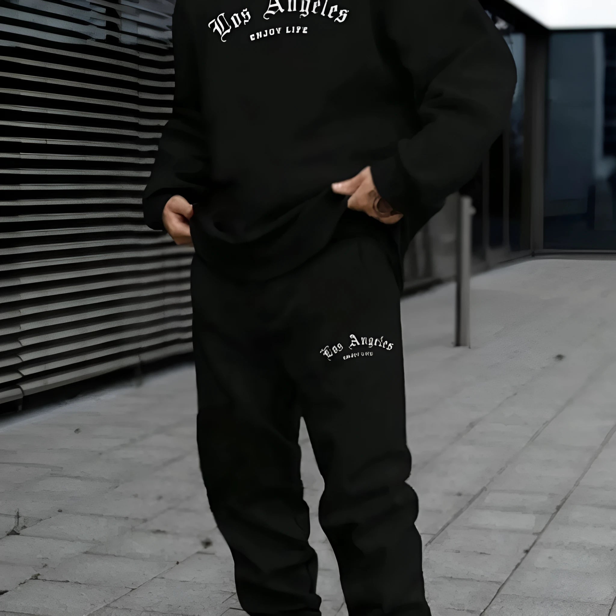 Men's grey hoodie sweat suit set with letter printing on the chest and matching trousers
