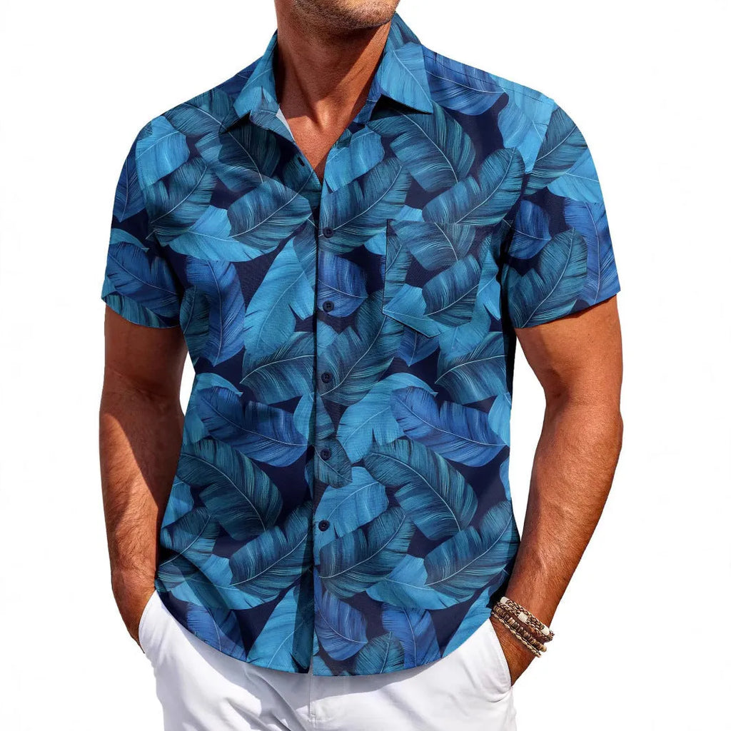 Man wearing a slim-fit Hawaiian pattern short-sleeve shirt in a casual setting.