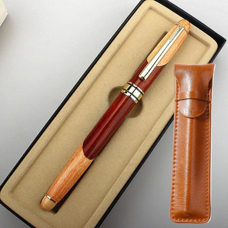 Wooden fountain pen with metal nib shown with a fabric protective pen bag