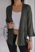 Women's waffle texture cardigan coat in army green with nine-quarter length sleeves and pockets.