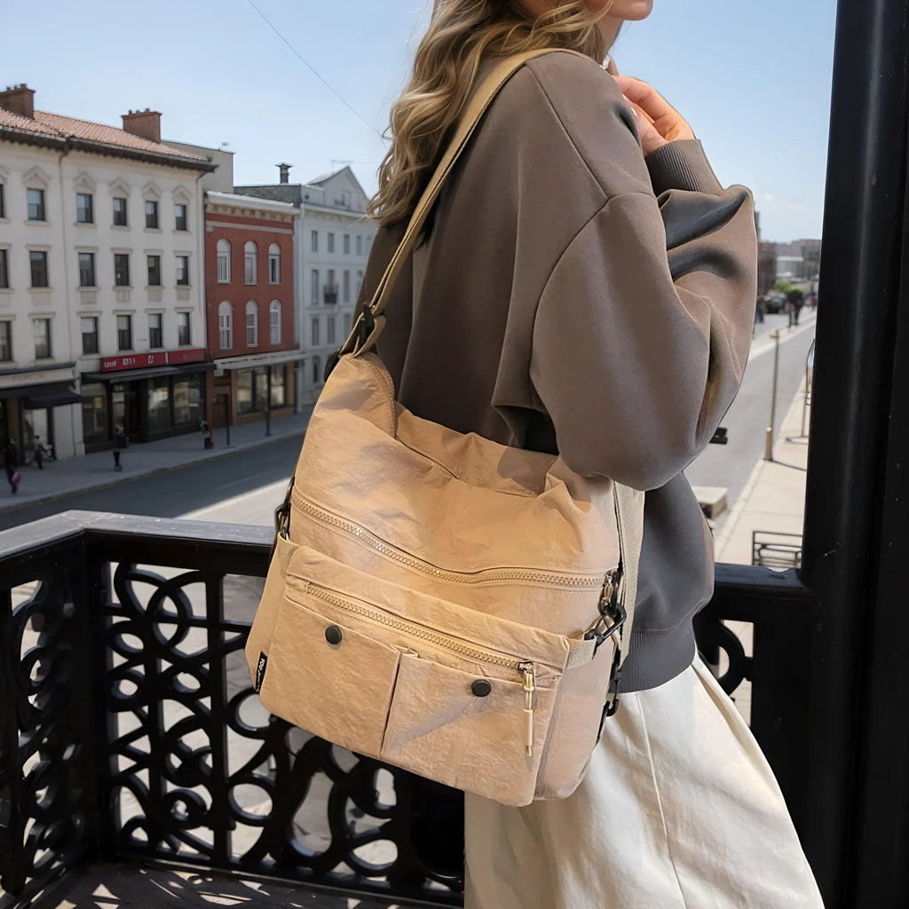 Women's nylon crossbody bag in square vertical shape with double shoulder straps and three-dimensional pockets