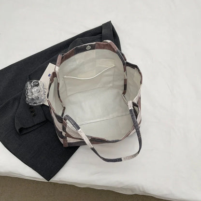 Women's denim tote bag with colour-contrast check design for daily use