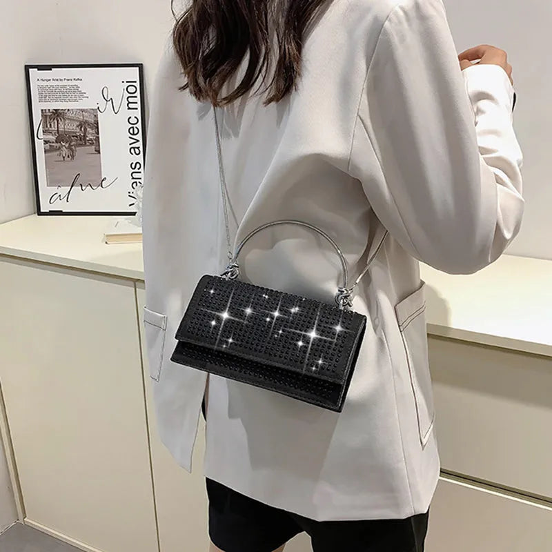 Small square chain crossbody bag for women with rhinestones in silver and black, PU construction with crossbody strap