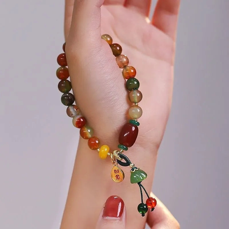 Handmade mixed material bracelet featuring a Lotus and Ruyi charm design, M990 style.
