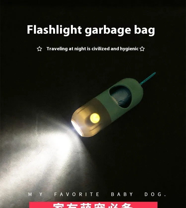Compact LED pet waste bag dispenser in blue grey with a dog lead attachment and illuminated button