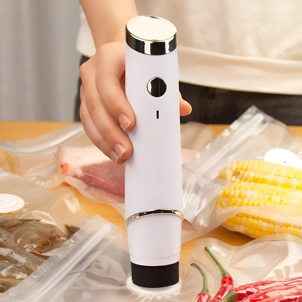 White USB electric vacuum food sealer with five plastic fresh-keeping bags for kitchen storage