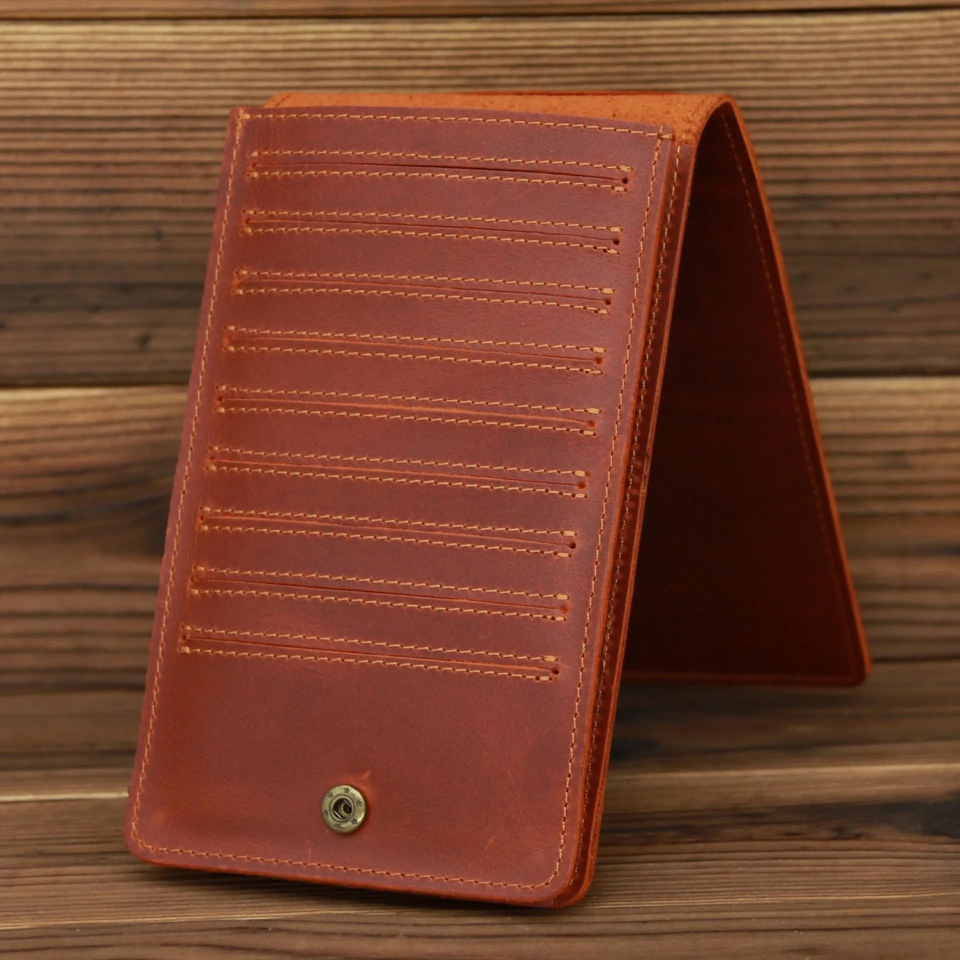 Men's cowhide card wallet with multiple slots shown open, displaying card and phone compartments.