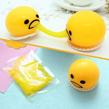 Gudetama Vomiting Egg Toy in green, orange, pink, and yellow