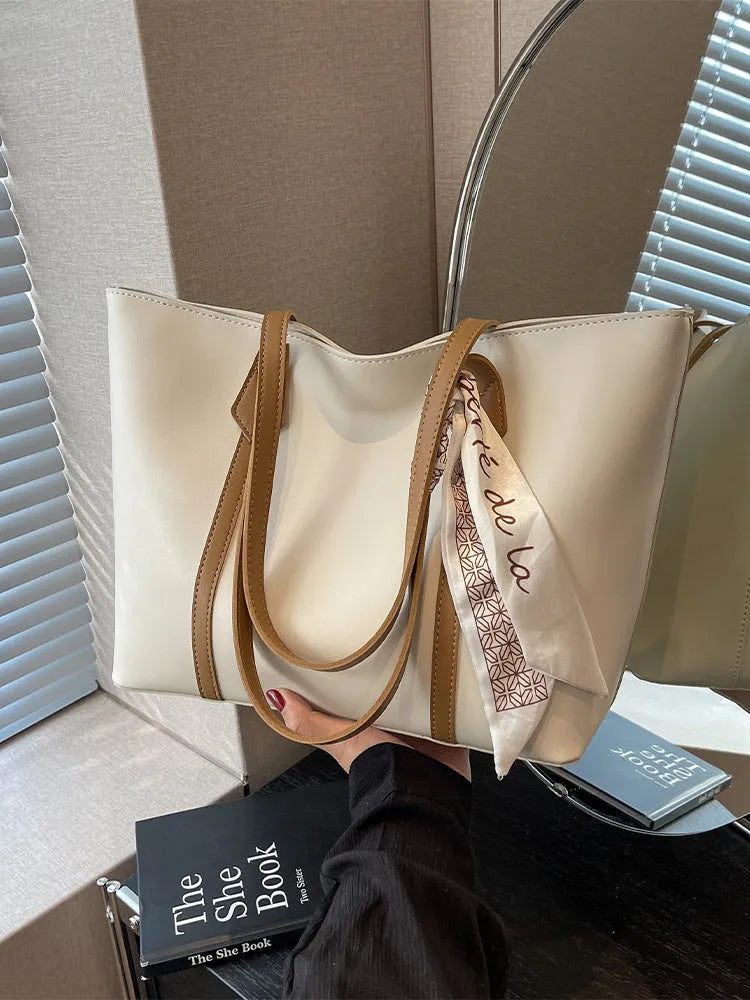 Women's large capacity tote shoulder bag in multiple colour options showing bucket design with sandwich pocket
