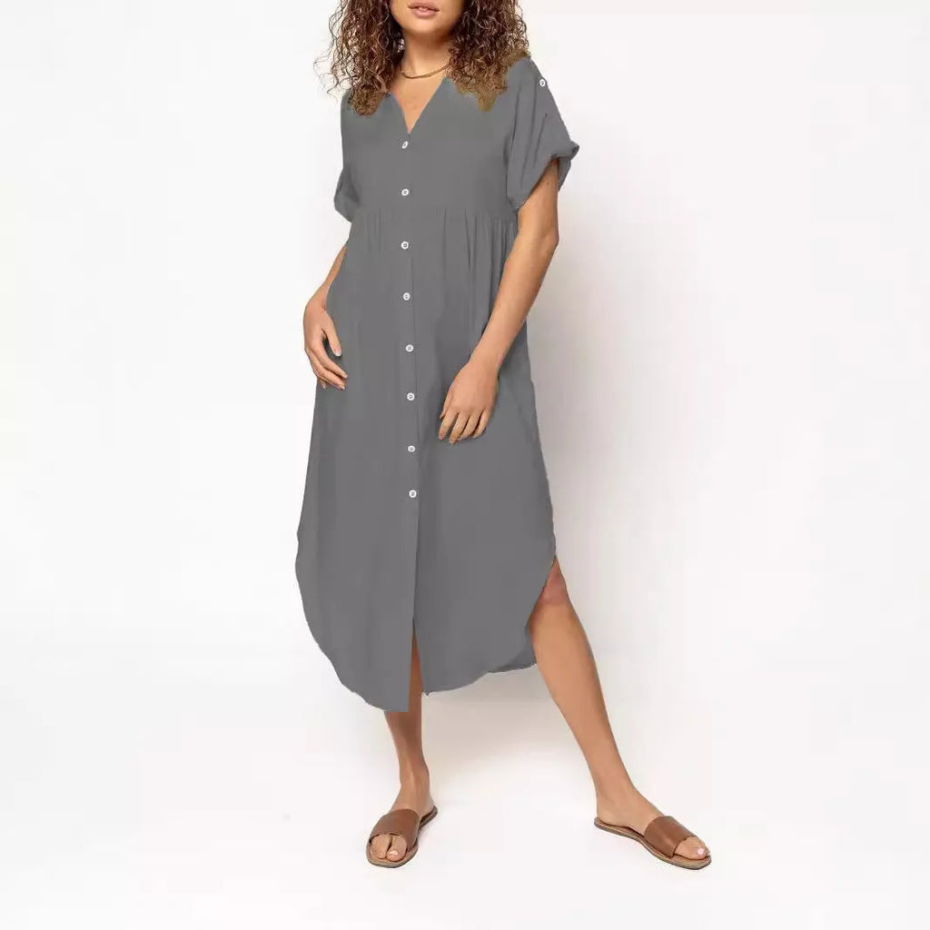 Loose fit solid colour midi dress with button fastening on a hanger.