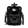 Black mini square crossbody bag with detailed skull embossing, rivets, and a shoulder strap.