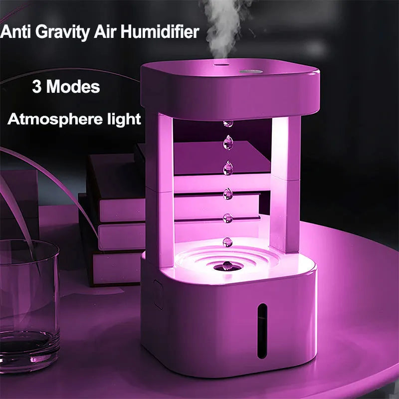 White anti-gravity water drop humidifier with coloured lights and USB cable
